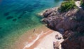 One person in Aiguille beach in Theoule sur Mer on the French Riviera Royalty Free Stock Photo