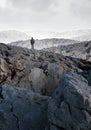 One person alone in the middle of a stone desert