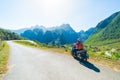 One person riding bike on Ha Giang motorbike loop, famous travel destination bikers easy riders. Ha Giang karst geopark mountain