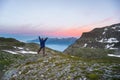 One person watching sunrise high up in the Alps