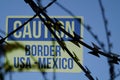 Barbed wire and border between USA and Mexico