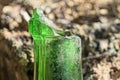 one piece of broken green dirty glass bottle neck Royalty Free Stock Photo