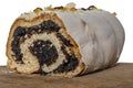 One piece of poppy seed roll isolated on white. Tasty cake