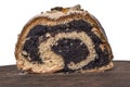 One piece of poppy seed roll isolated on white. Tasty cake