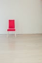 Pink chair in an empty white interior room Royalty Free Stock Photo