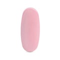 One pink pill on white background. Medicinal treatment Royalty Free Stock Photo