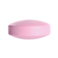 One pink pill on white background. Medicinal treatment Royalty Free Stock Photo