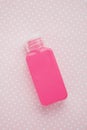 One pink plastic bottle for transfusion of cosmetic