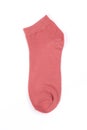 One pink short sock on a white background, top view Royalty Free Stock Photo