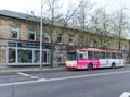 One pink trolleybus on the street in Vilnius