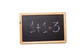 One plus one equal three written on a blackboard on a white background Royalty Free Stock Photo