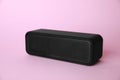 One portable bluetooth speaker on pink background. Audio equipment Royalty Free Stock Photo