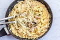 One Pot Chicken Alfredo Pasta in a Skillet Directly from Above Photo