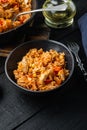 One Pot Chicken Enchilada Rice Casserole, on black wooden table background Royalty Free Stock Photo