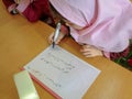 One of the primary school girls in Rasht, Guilan province, Iran. An Islamic school where girls should wear scarves and dress