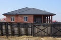 One private house of red bricks with white windows Royalty Free Stock Photo