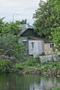 one private white brown house among green trees Royalty Free Stock Photo