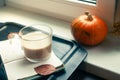 One pumpkin squash and a latte coffee made with with plant based oat soya or almond milk Royalty Free Stock Photo