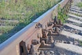 One rail on concrete sleepers with joint closeup Royalty Free Stock Photo