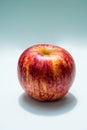 One red apple placed on the table. Royalty Free Stock Photo