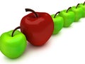 One red apple among row of green apples Royalty Free Stock Photo