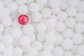 One red ball leader on many white balls Royalty Free Stock Photo