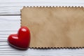 One red heart and blank paper sheet Royalty Free Stock Photo