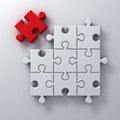 One red jigsaw puzzle the last piece stand out from the crowd different concept on white wall background with shadow Royalty Free Stock Photo