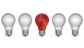 One red light bulb in row of white ones. Front view Royalty Free Stock Photo