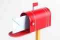 One red mailbox with an envelope inside on a white background Royalty Free Stock Photo