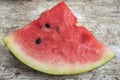 Watermelon pieces on the old board close up Royalty Free Stock Photo