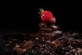 One red straberry on a dark chocolate Royalty Free Stock Photo