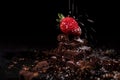 One red straberry on a dark chocolate Royalty Free Stock Photo