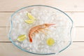 One red tiger shrimp with lime on ice Royalty Free Stock Photo