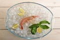 One red tiger shrimp with lime on ice Royalty Free Stock Photo