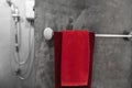 One red towel in bathroom on a dryer. Counter bathroom interior contemporary. Luxury and stylish design bathroom with a Royalty Free Stock Photo