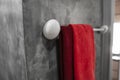 One red towel in bathroom on a dryer. Counter bathroom interior contemporary. Luxury and stylish design bathroom with a Royalty Free Stock Photo