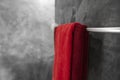 One red towel in bathroom on a dryer. Counter bathroom interior contemporary. Luxury and stylish design bathroom with a Royalty Free Stock Photo