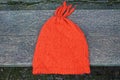 one red woolen winter hat with a knitted pattern Royalty Free Stock Photo
