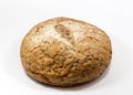One round grain bread isolated on a white background.Whole fresh wheat and rye small bread with a lot of seeds Royalty Free Stock Photo