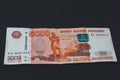 One Russian bill in the amount of 5000 rubles lies on a black background Royalty Free Stock Photo