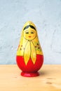 One russian doll on wooden table Royalty Free Stock Photo