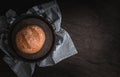 One rye round bread on a black background. Royalty Free Stock Photo