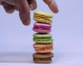 One`s taking yellow macaron.