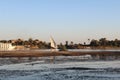 One sail boat lying on the river shore in Egypt