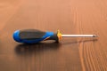 One screwdriver close up on a brown Board Royalty Free Stock Photo