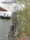 One of the sculptural figures on the legendary Charles Bridge across the Vltava River in Prague, Czech Republic.