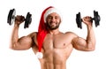 Double bicep Santa Claus with muscular body in red and white christmas hat, torso. White background, Isolated, alone Royalty Free Stock Photo