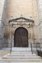 One of the side entrances of the Santiago Apostol Church, 16th century, in the town of Cebreros, Avila, Spain