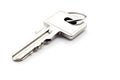 one simple silver metal key with ring isolated on white background, neural network generated image Royalty Free Stock Photo